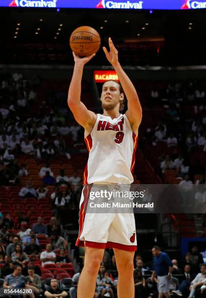 Miami Heat center Kelly Olynyk attempts a shot during the second quarter of an NBA preseason basketball game against the Atlanta Hawks on Sunday,...