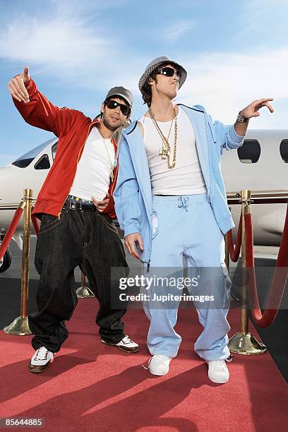 urban celebrities with private airplane - celebrity fake stock pictures, royalty-free photos & images