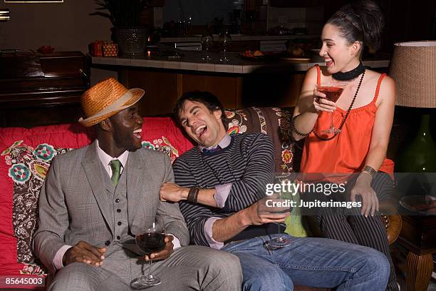 small group of people laughing - cocktail party home stock pictures, royalty-free photos & images