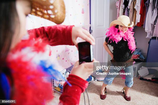 girl playing dress-up - boa mother stock pictures, royalty-free photos & images