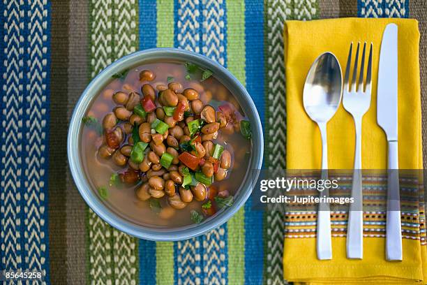 pinto beans and silverware - bean stock pictures, royalty-free photos & images