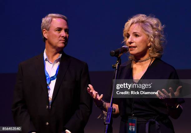 Of Tennessee Oncology Dr. Jeff Patton and CEO of Sarah Cannon Dee Anna Smith speak onstage during Band Against Cancer with Sarah Cannon on a special...