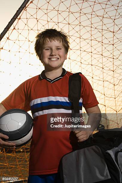portrait of soccer player - sporttas stockfoto's en -beelden