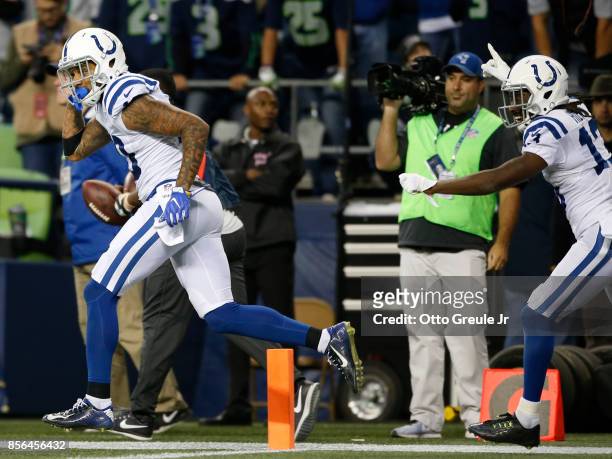 Wide receiver Donte Moncrief of the Indianapolis Colts celebrates his touchdown with wide receiver T.Y. Hilton against the Seattle Seahawks in the...