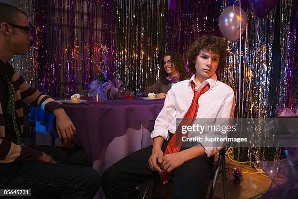 bored teenage boy at prom - prom imagens e fotografias de stock