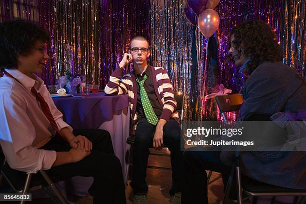 bored teenage boy at prom - prom dancing stock pictures, royalty-free photos & images