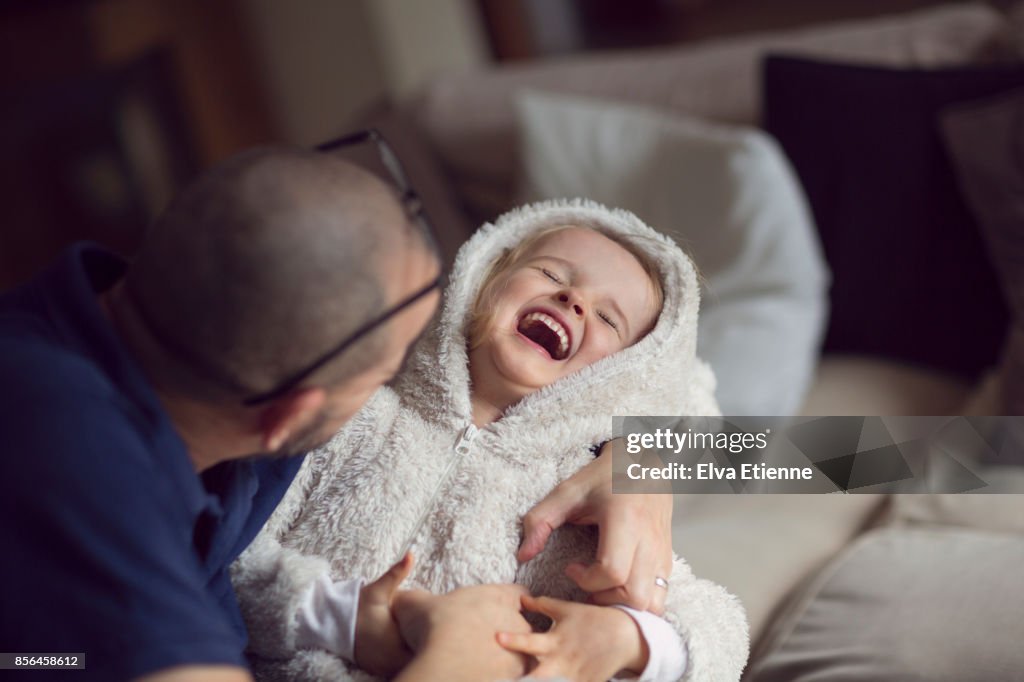 Laughter and affection between father and child