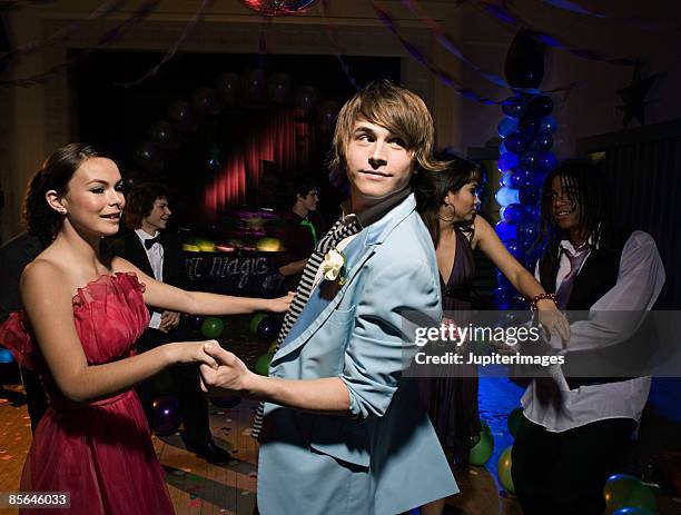 teenagers dancing together at prom - prom dancing stock pictures, royalty-free photos & images