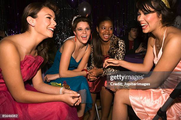 teenage girls engaged in conversation at prom - high school prom stock pictures, royalty-free photos & images