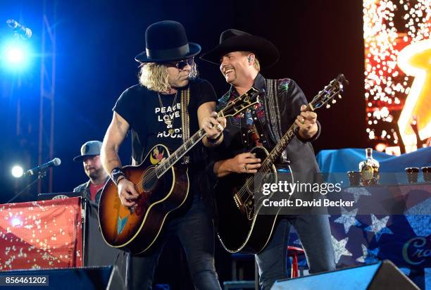Recording artists Big Kenny and John Rich of Big & Rich perform during the Route 91 Harvest country music festival at the Las Vegas Village on...
