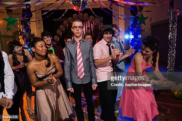 awkward teenage boy at prom - introvert stock pictures, royalty-free photos & images
