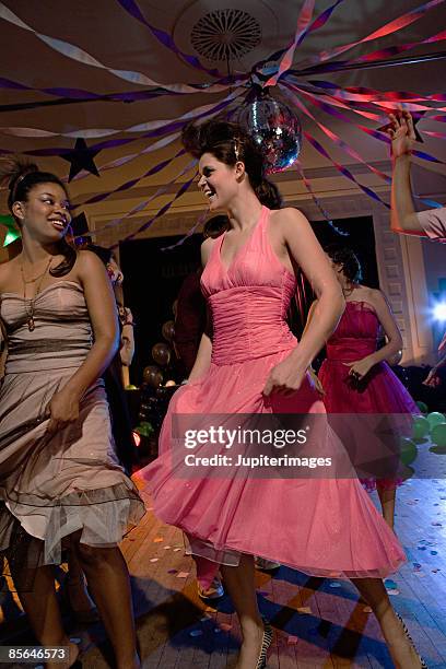 teenage girls dancing at prom - prom dancing stock pictures, royalty-free photos & images