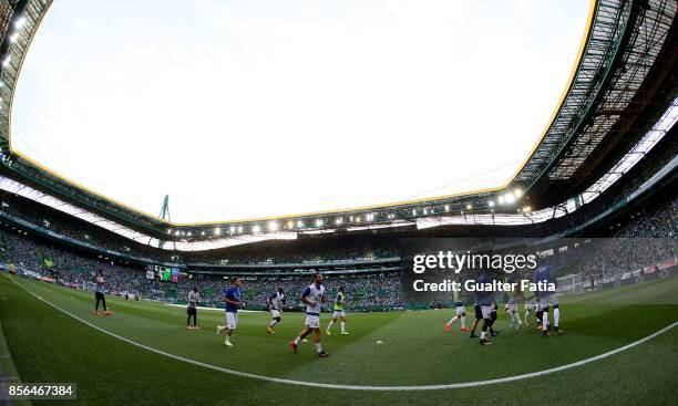 Porto players in action during warm up before the start of the Primeira Liga match between Sporting CP and FC Porto at Estadio Jose Alvalade on...