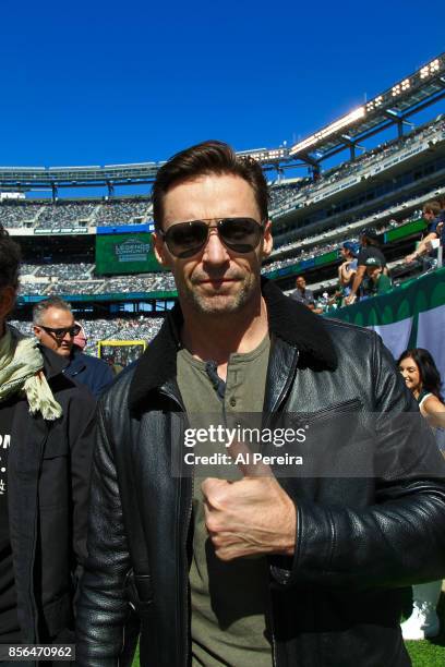 Hugh Jackman poses on the sideline when he attends the Jacksonville Jaguars vs New York Jets game at MetLife Stadium on October 1, 2017 in East...