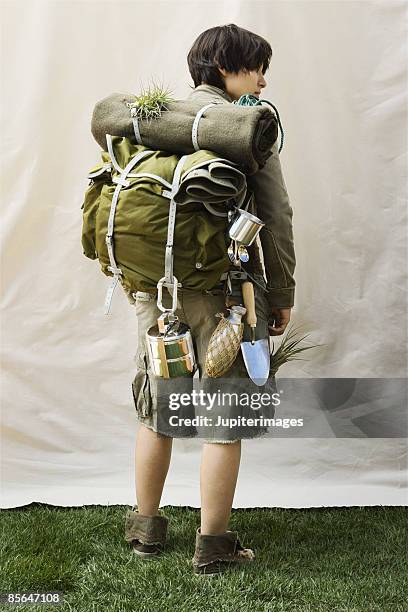 woman with backpack - survivalist stock pictures, royalty-free photos & images