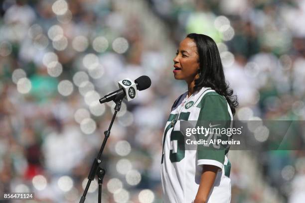 Heather Hill performs the National Anthem before the Jacksonville Jaguars vs New York Jets game at MetLife Stadium on October 1, 2017 in East...