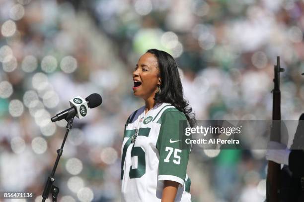 Heather Hill performs the National Anthem before the Jacksonville Jaguars vs New York Jets game at MetLife Stadium on October 1, 2017 in East...