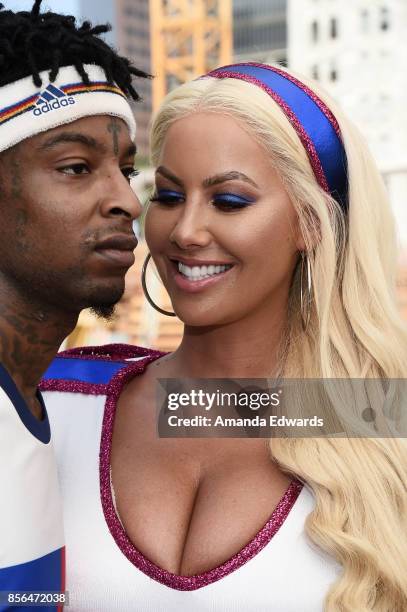 Model Amber Rose and rapper 21 Savage attend the 3rd Annual Amber Rose SlutWalk on October 1, 2017 in Los Angeles, California.