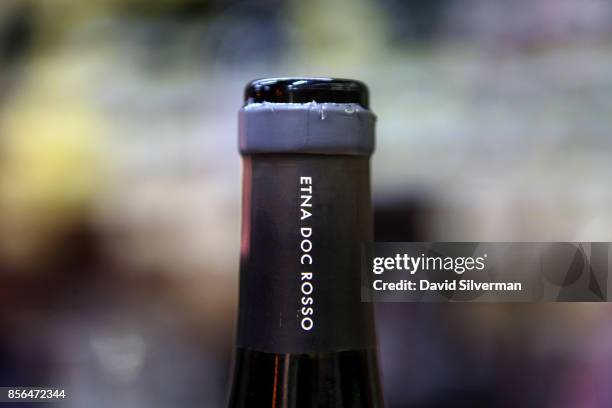 Bottle of Etna Rosso red wine during a tasting evening at the Il Buongustaio dell'Etna wine bar on September 21, 2017 in the village of Randazzo on...