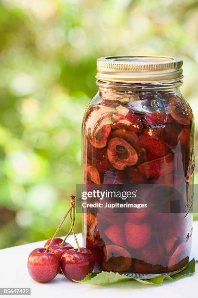 preserved cherries - mason jar stock pictures, royalty-free photos & images