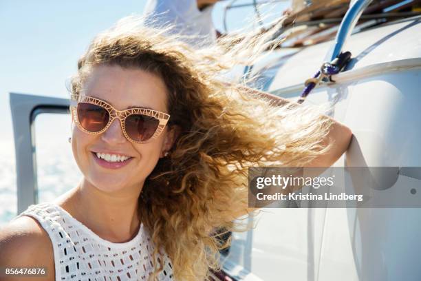 group of friends with a surf van by the sea - tossing hair facing camera woman outdoors stock pictures, royalty-free photos & images