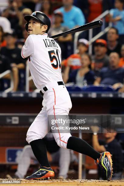 Ichiro Suzuki of the Miami Marlins pops up to left in the sixth inning of a game against the Atlanta Braves on Oct. 1, 2017 in Miami. Suzuki stood at...