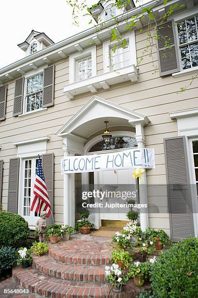 welcome home sign on house - welcome home stock pictures, royalty-free photos & images
