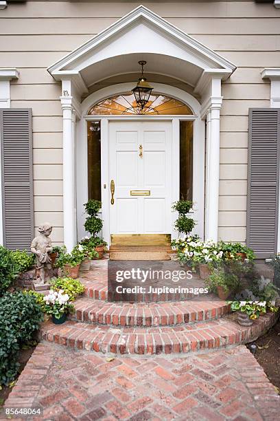 front door of house - front door stock pictures, royalty-free photos & images