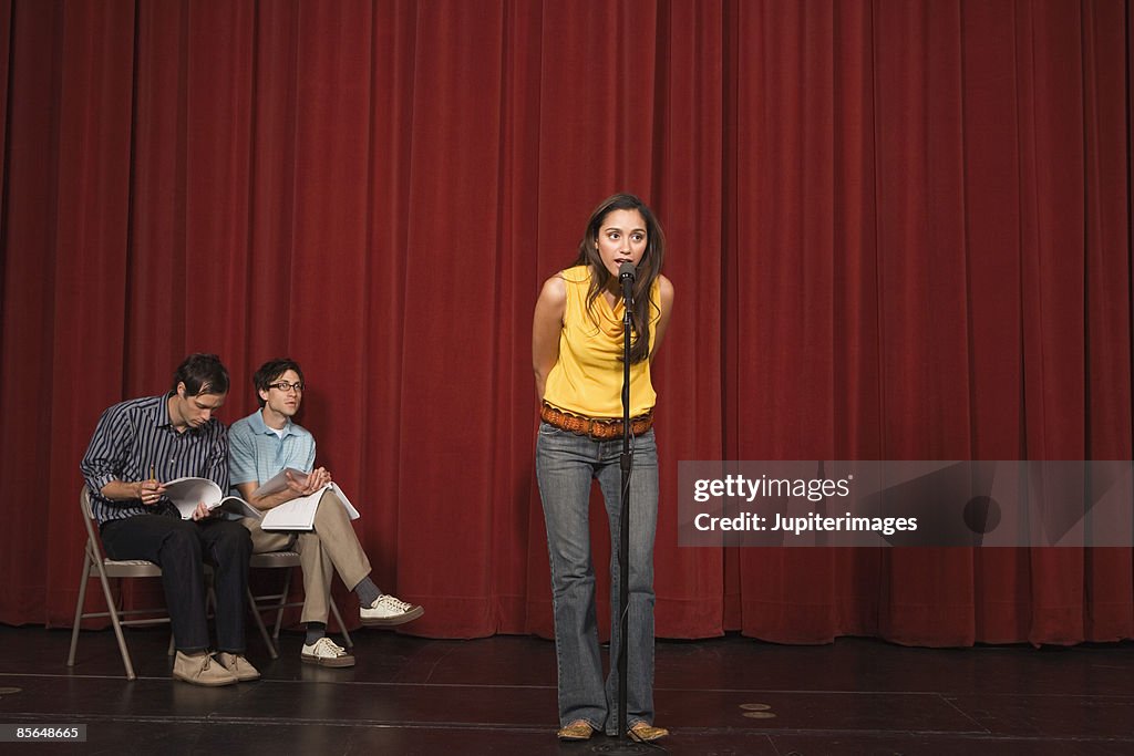 Woman performing on stage