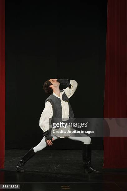 expressive actor on stage - dramatic actor stock pictures, royalty-free photos & images
