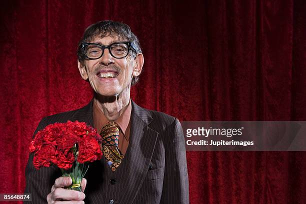 man with carnations - flower arrangement carnation ストックフォトと画像