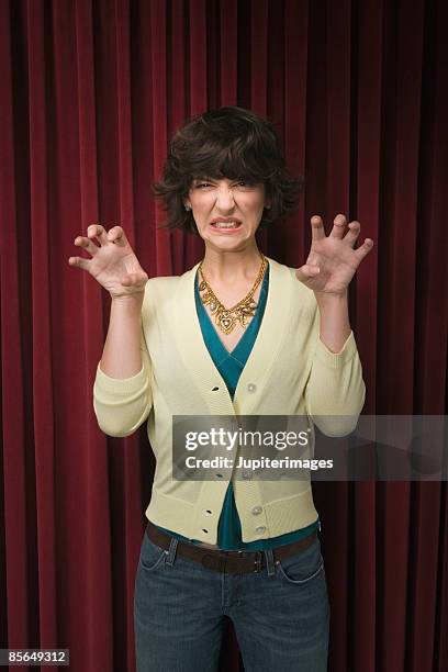 woman showing claws on stage - hand claw stock pictures, royalty-free photos & images