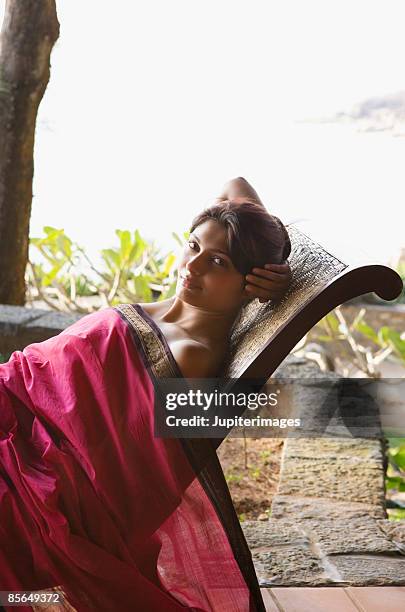 woman relaxing, india - kerala saree stock pictures, royalty-free photos & images