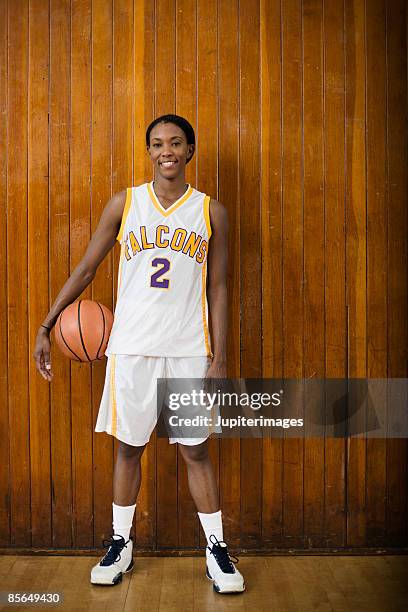 woman basketball player - uniforme di basket foto e immagini stock