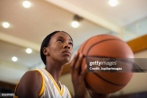 woman basketball player - basketballspieler stock-fotos und bilder