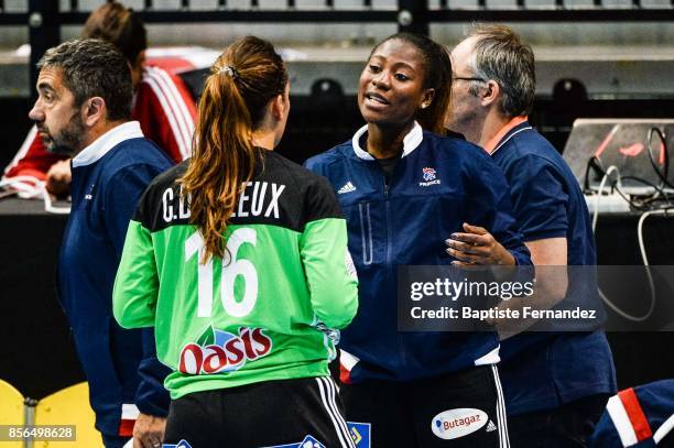 Catherine Gabriel of France talk with Cleopatre Darleux of France during the handball women's international friendly match between France and Brazil...