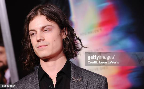 Singer Borns attends the premiere of "Flatliners" at The Theatre at Ace Hotel on September 27, 2017 in Los Angeles, California.