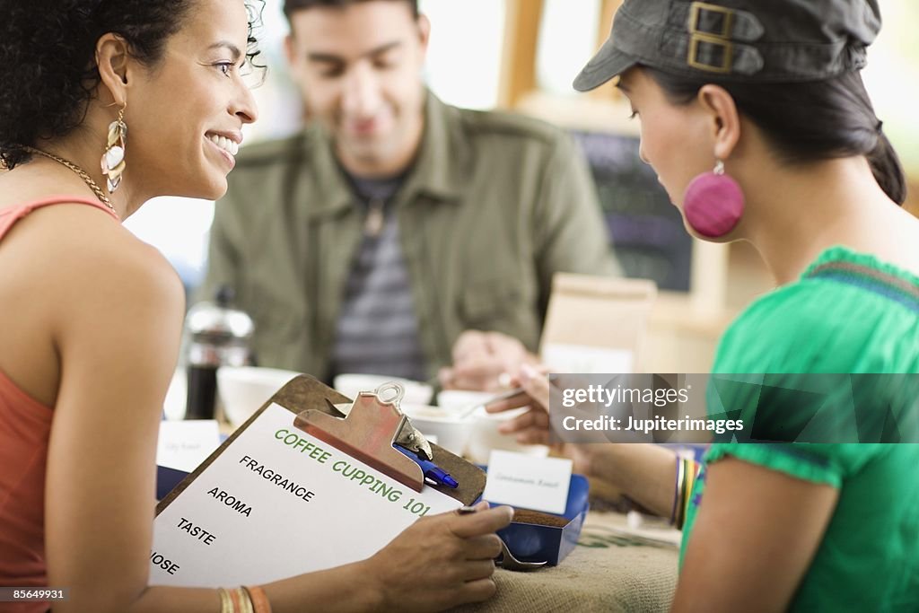 People at coffee samples in cafe