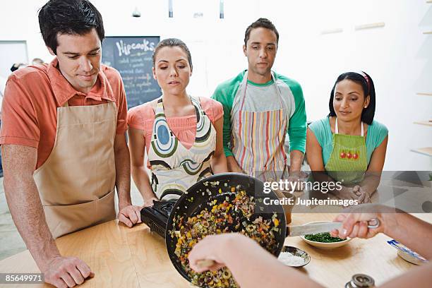 cooking students watching demonstration - home economics class stock pictures, royalty-free photos & images
