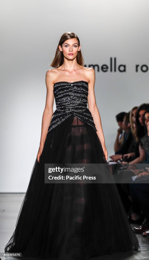 A model walks runway for the Pamella Roland Spring/Summer...