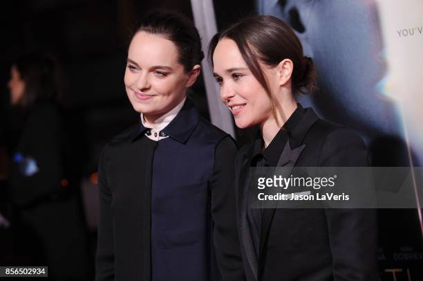 Emma Portner and Ellen Page attend the premiere of "Flatliners" at The Theatre at Ace Hotel on September 27, 2017 in Los Angeles, California.