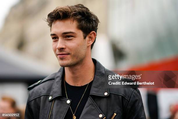 Francisco Lachowski wears a black leather jacket, and attends Le Defile L'Oreal Paris as part of Paris Fashion Week Womenswear Spring/Summer 2018 at...