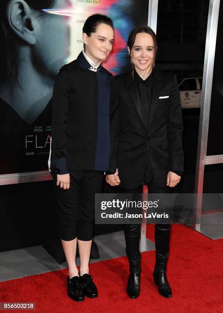 Emma Portner and Ellen Page attend the premiere of "Flatliners" at The Theatre at Ace Hotel on September 27, 2017 in Los Angeles, California.