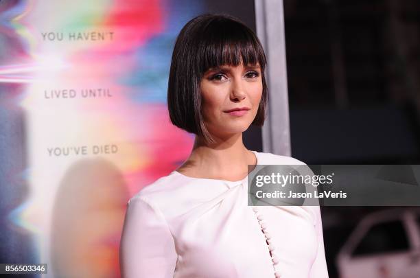 Actress Nina Dobrev attends the premiere of "Flatliners" at The Theatre at Ace Hotel on September 27, 2017 in Los Angeles, California.