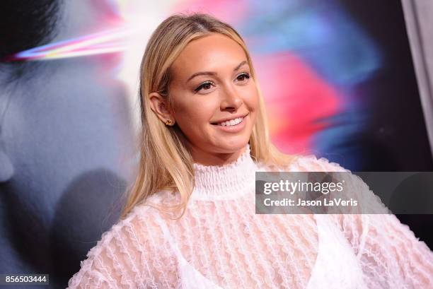 Corinne Olympios attends the premiere of "Flatliners" at The Theatre at Ace Hotel on September 27, 2017 in Los Angeles, California.