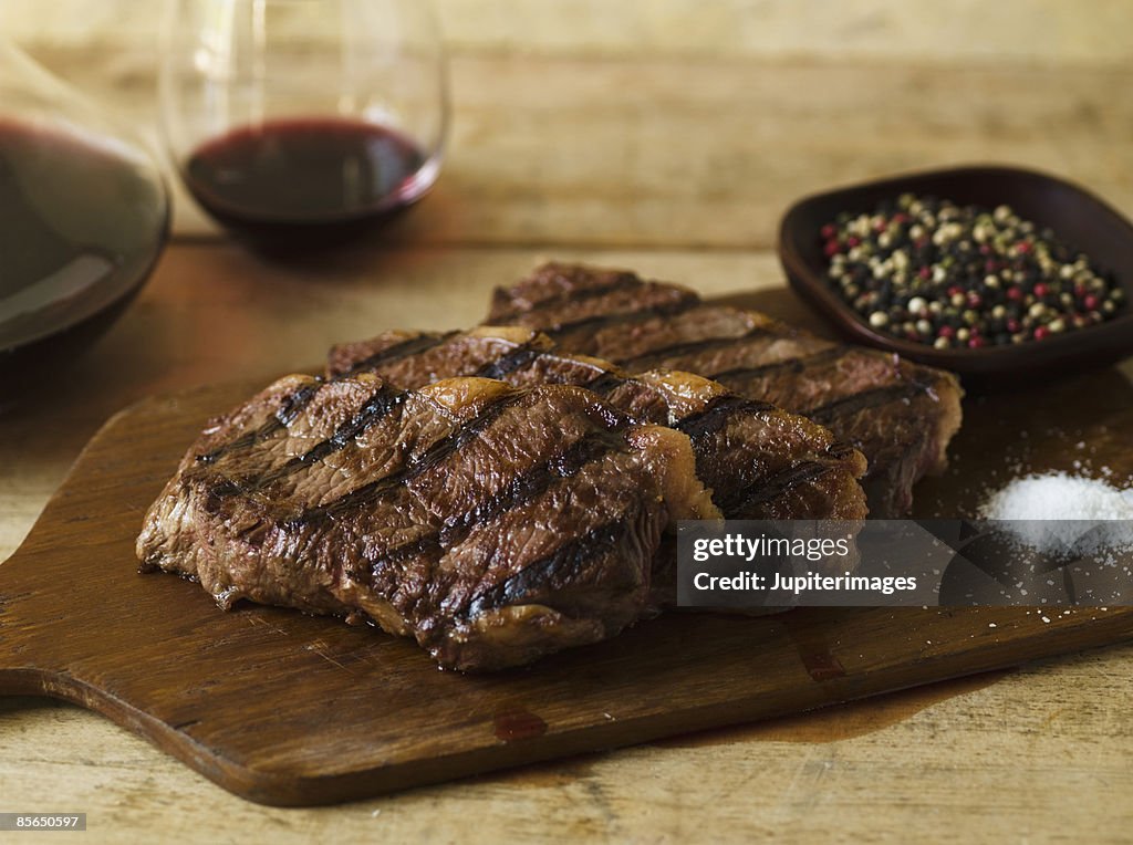 Steak dinner with peppercorn and salt seasonings