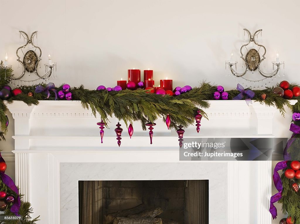 Mantle and fireplace with holiday decorations