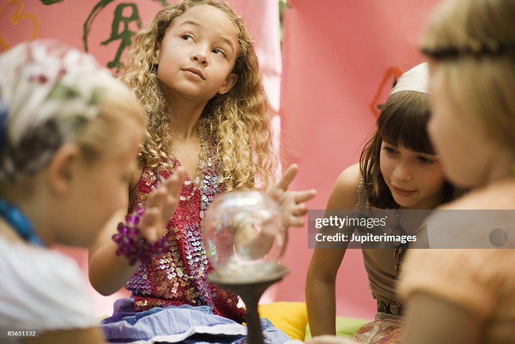 Fortune telling girls with crystal ball