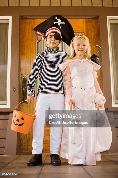 children in halloween costumes - princess pirates stock pictures, royalty-free photos & images