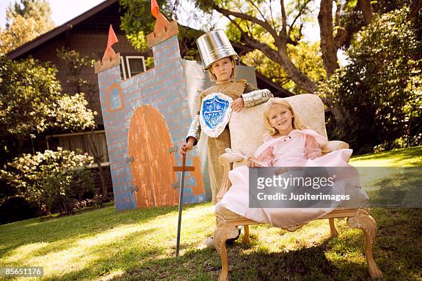 children in knight and princess costumes - princess castle stock pictures, royalty-free photos & images
